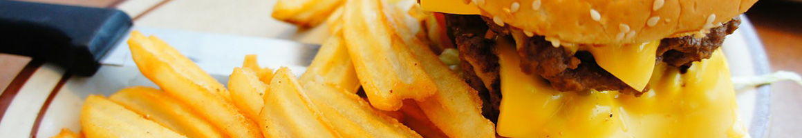 Eating Burger Cuban Fast Food at El Rey De Las Fritas restaurant in Miami, FL.